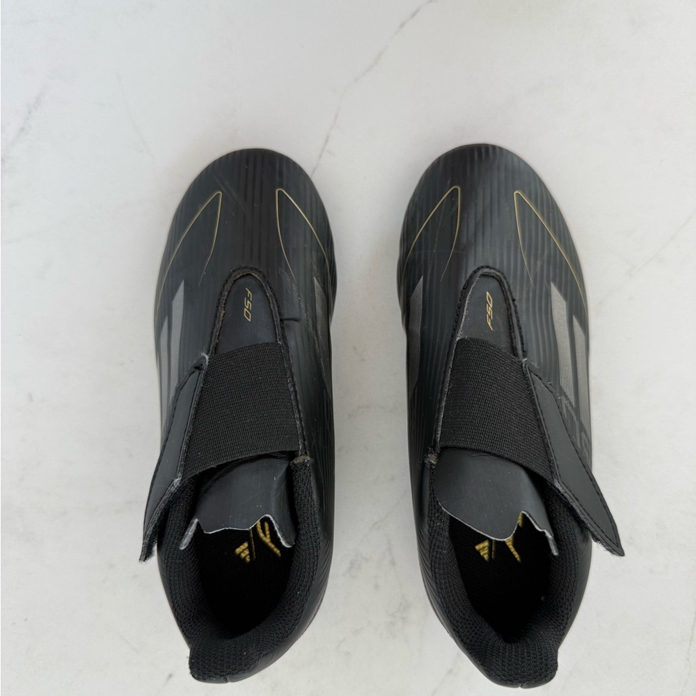adidas Black Soccer Cleats with Gold Trim
